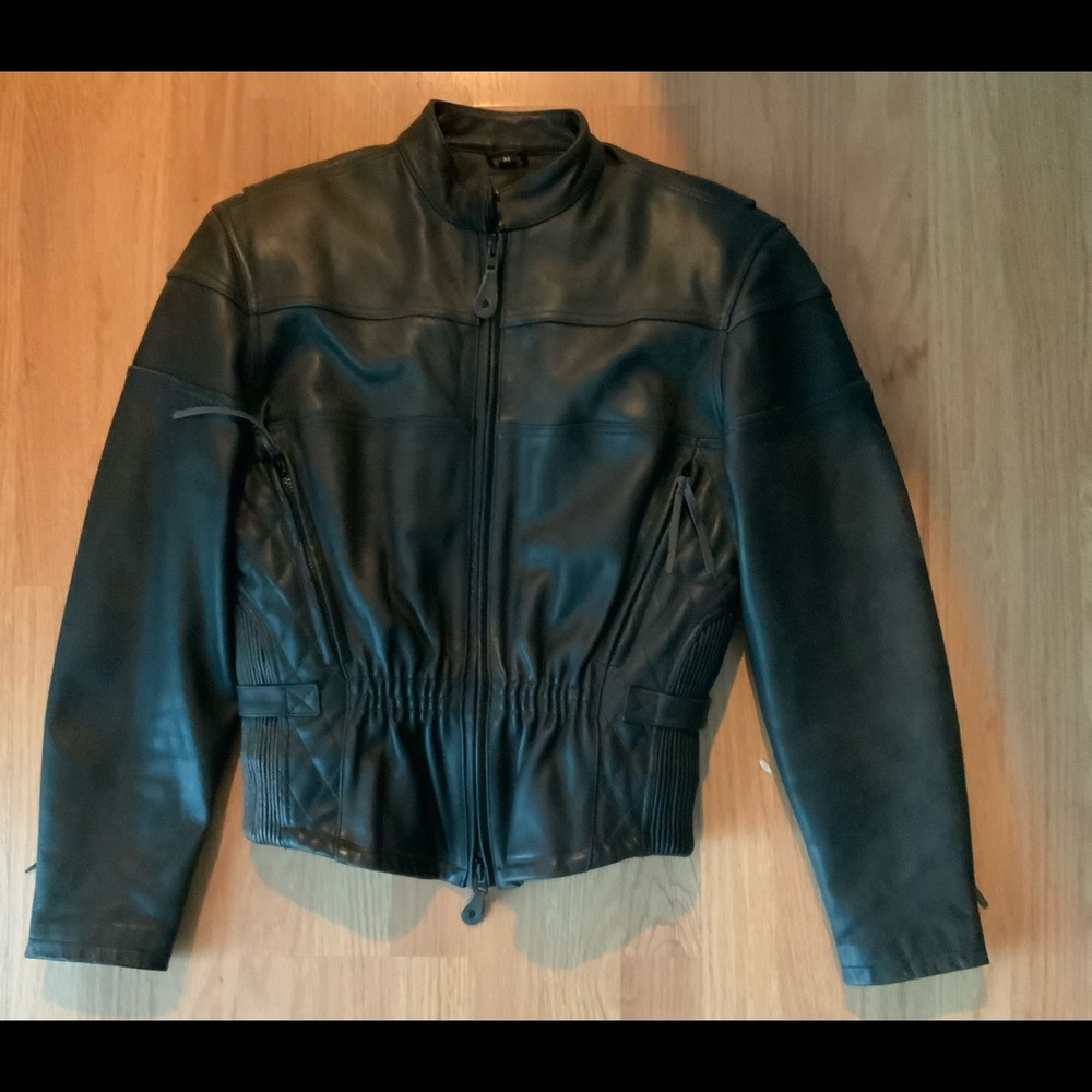 Black Vanguard Leather of America Inc. Leather jacket.